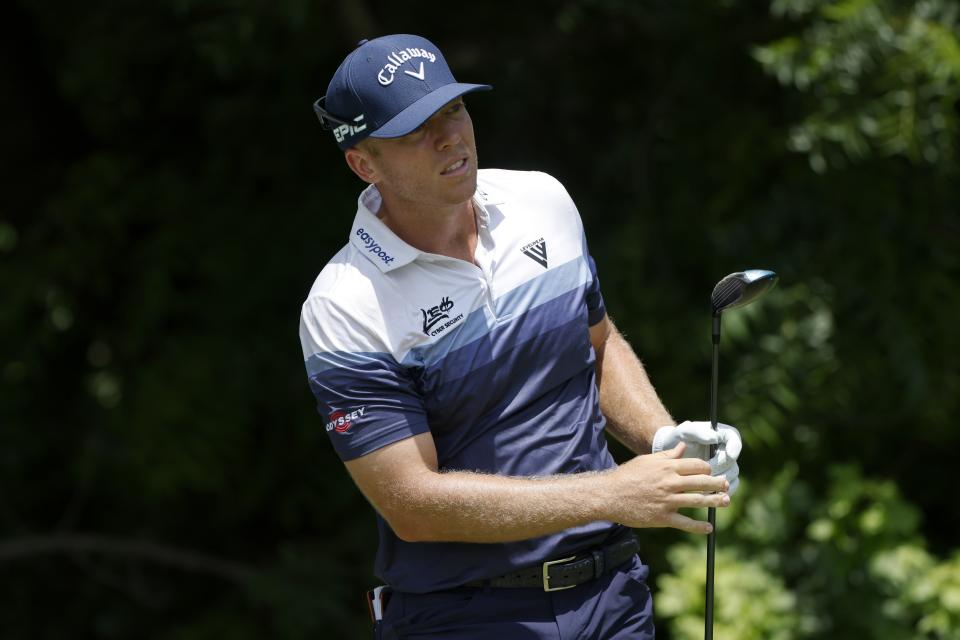 Talor Gooch watches his shot off the sixth tee during the third round of the Charles Schwab Challenge golf tournament at the Colonial Country Club in Fort Worth, Texas, Saturday May 29, 2021. (AP Photo/Ron Jenkins)