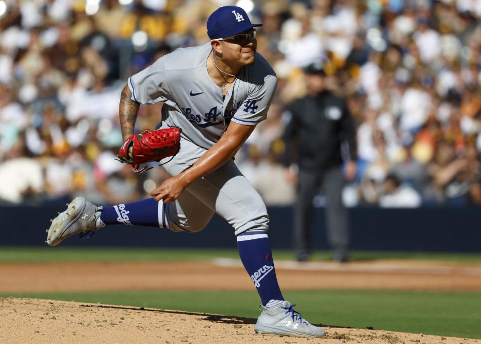 Dodgers pitcher Julio Ur throws against the San Diego Padres on Sunday.