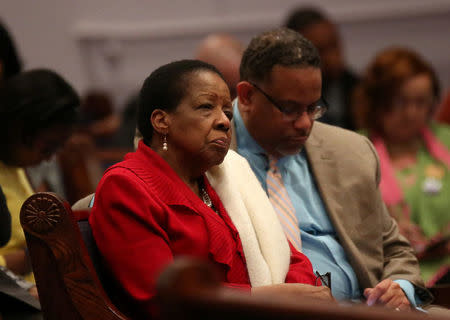 A church member listens to Democratic Alabama U.S. Senate candidate Doug Jones during his visit to the Progressive Union Missionary Baptist Church in Huntsville, Alabama, U.S. December 10, 2017. REUTERS/Marvin Gentry