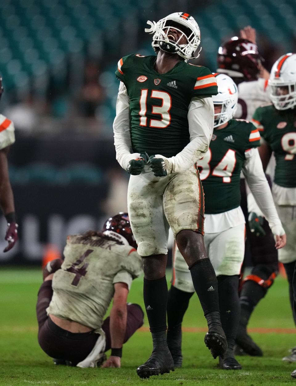 The Hurricanes' Deandre Johnson celebrates a sack against Virginia Tech last season.