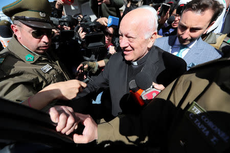 Archbishop of Santiago, Ricardo Ezzati, leaves the prosecutor's building after a hearing over allegations he covered-up sexual abuse of minors, in Rancagua, Chile, October 3, 2018. REUTERS/Ivan Alvarado