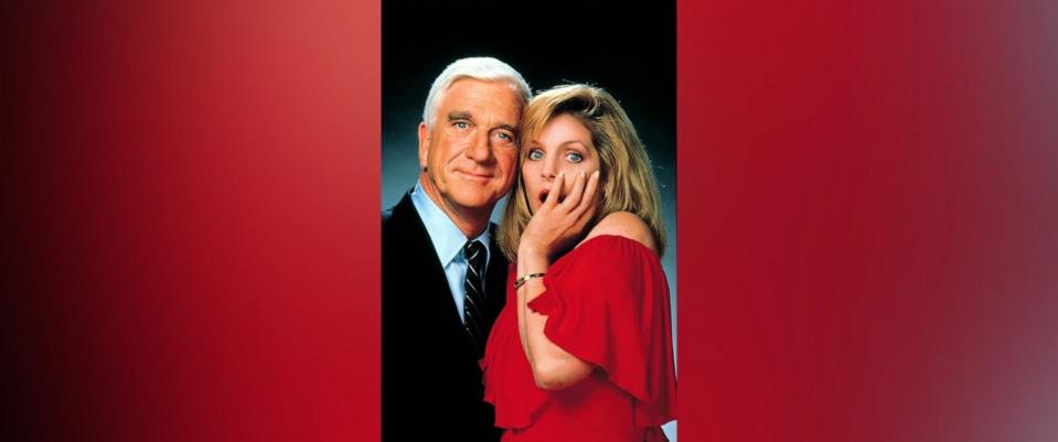 PHOTO: Leslie Nielsen and Priscilla Presley are show in a promo photo for the 1988 movie 'The Naked Gun.' (Moviestore/Shutterstock)