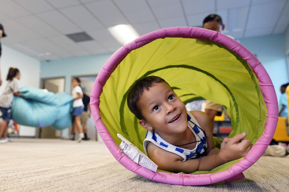 Aleksander Robinson, 7, plays at a Friends of the Children office Wednesday, Aug. 24, 2022, in Lancaster, Calif. Billionaire philanthropist MacKenzie Scott donated $44 million to the Oregon-based mentoring organization, Friends of the Children, which supports children at risk of entering the welfare system by pairing them with a longtime mentor. (AP Photo/Marcio Jose Sanchez)