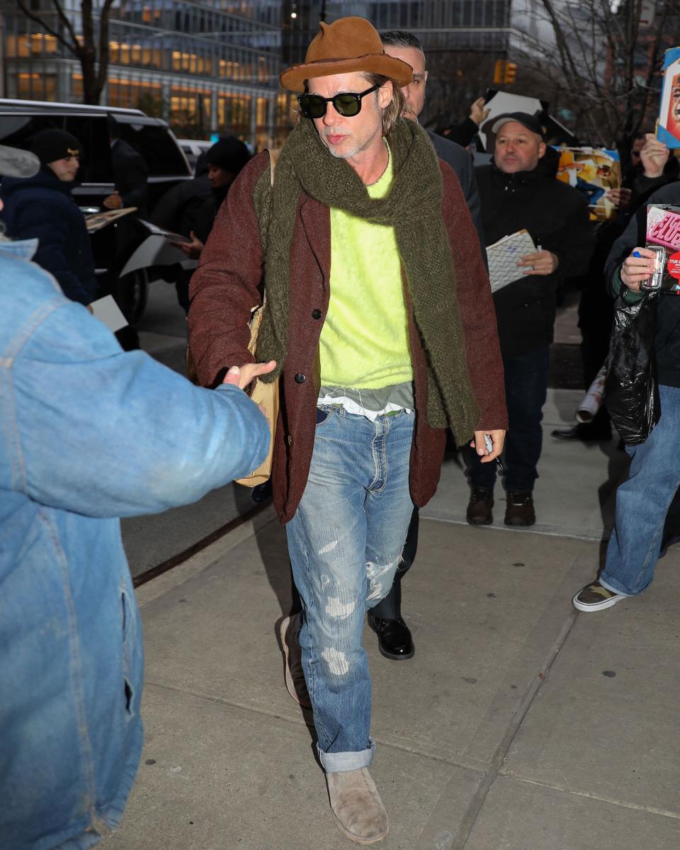 Wearing all neon is merely brave, while wearing neon and earth tones is a truly courageous Brad Pitt.