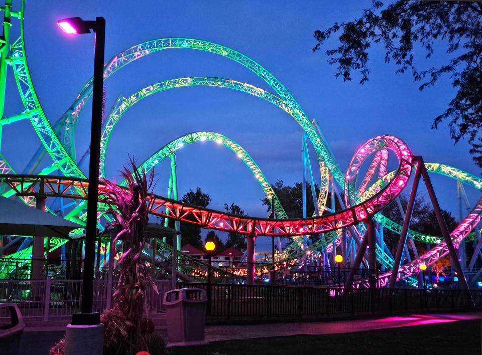 At night, the Monster roller coaster is lit up during Phantom Fall Fest, which kicks off with four haunted houses, four scare zones with zombies and creepy creatures, and more at Adventureland Park.