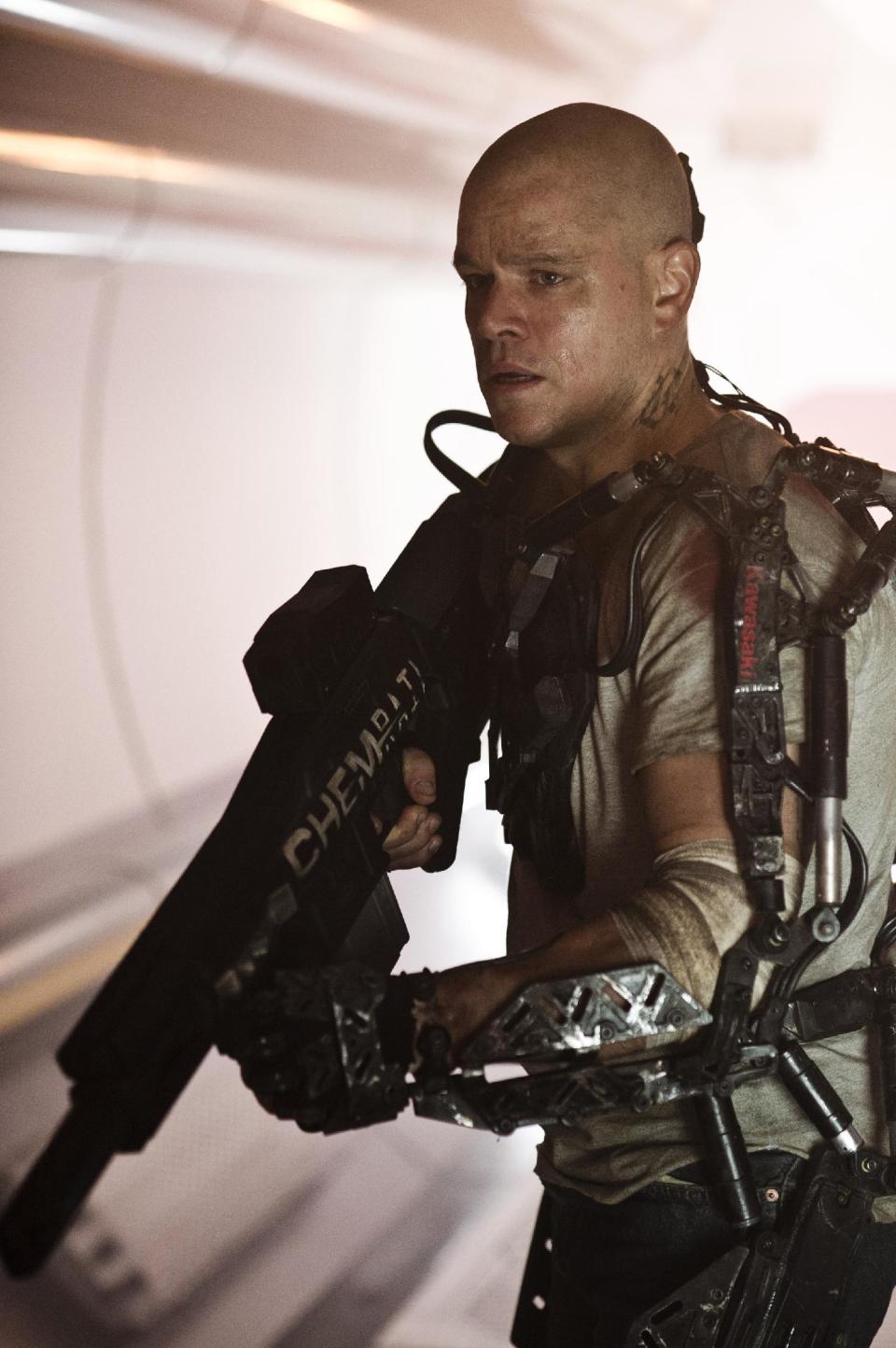 This publicity photo released by Columbia TriStar Marketing Group, shows Matt Damon starring in Columbia Pictures' "Elysium." (AP Photo/Columbia TriStar Marketing Group, Stephanie Blomkamp)