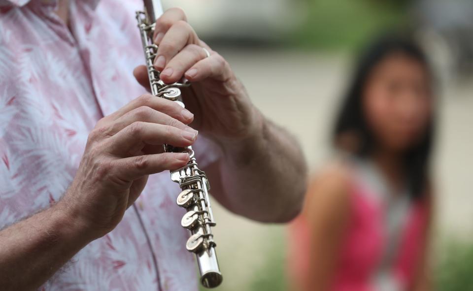 Doug Yeager played the flute at the Gun Violence Prevention Team’s vigil and a call to action in response to the shooting that killed two people and injured several others Sunday morning. It was at Crescent Hill Presbyterian Church.Aug 27, 2023 