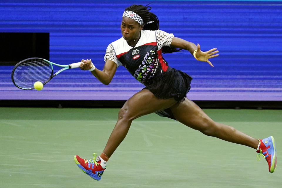 Coco Gauff, of the United States, returns against Shuai Zhang, of China, during the fourth round of the U.S. Open tennis championships, Sunday, Sept. 4, 2022, in New York. (AP Photo/Julia Nikhinson)