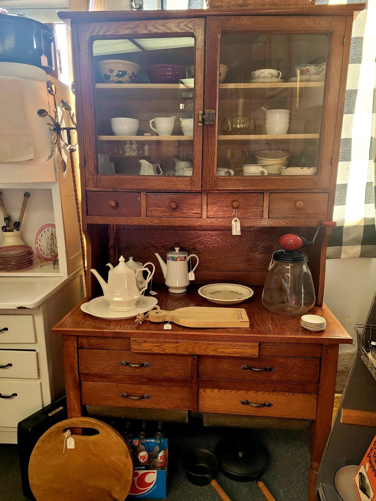 A baker's cabinet is part of the inventory that's 25% off at The Cottage Door Antiques & Gifts.