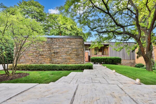 From street view, the sprawling 6,370-square-foot residence appears to only be one level.