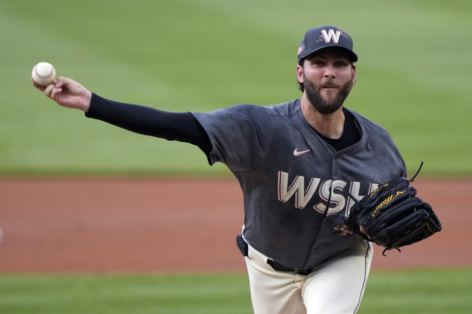 Washington Nationals pitcher Trevor Williams (32) delivers against the Baltimore Orioles during the first inning of a baseball game at Nationals Park in Washington, Tuesday, May 7, 2024. (AP Photo/Susan Walsh)