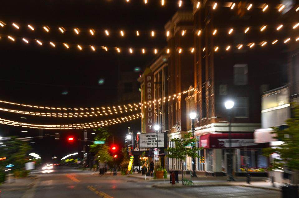 Newly-installed festoon lighting glows over St. Germain Street near the Paramount Theatre Tuesday, Sept. 7, 2021, in St. Cloud.