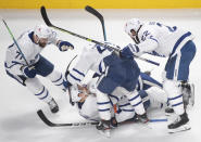 Toronto Maple Leafs' TJ Brodie (78) celebrates his goal against the Montreal Canadiens with teammates during the third period of Game 6 of an NHL hockey Stanley Cup first-round playoff seres Saturday, May 29, 2021, in Montreal. (Ryan Remiorz/The Canadian Press via AP)