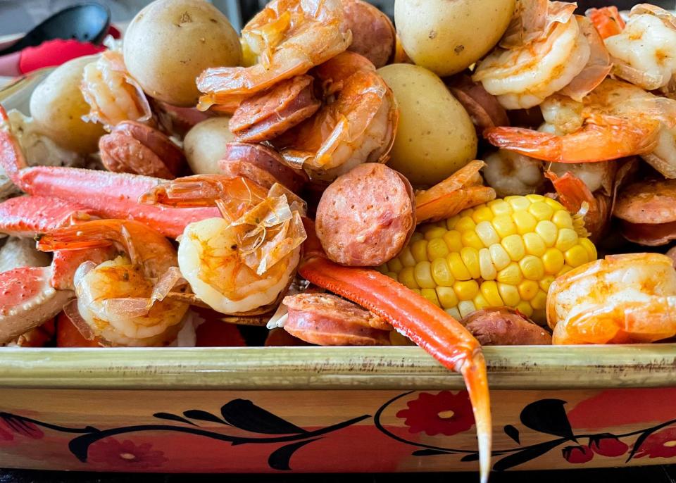 <p>This classic Lowcountry, South Carolina, dish, also called Low Country boil or Beaufort stew is the perfect way to enjoy the region’s ample culinary offerings. The main ingredients of Frogmore stew are fresh Carolina shrimp, yellow corn, redskin potatoes and smoked sausage, but some variations also include blue crab or stone crab claws. Typically this stew is with seasoned Old Bay, beer and hot sauce. Like most standard <a href="https://www.thedailymeal.com/recipes/seafood-boil-recipe-0?referrer=yahoo&category=beauty_food&include_utm=1&utm_medium=referral&utm_source=yahoo&utm_campaign=feed" rel="nofollow noopener" target="_blank" data-ylk="slk:seafood boils;elm:context_link;itc:0;sec:content-canvas" class="link ">seafood boils</a>, it’s dumped out onto a newspaper-topped table and served on paper plates with plenty of cold beer.</p>