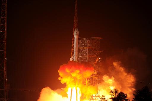 The Chang'e-3 rocket carrying the Jade Rabbit rover blasts off from the Xichang Satellite Launch Center in China's southwest province of Sichuan on December 2, 2013