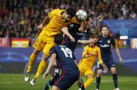 Football Soccer - Atletico Madrid v FC Barcelona - UEFA Champions League Quarter Final Second Leg - Vicente Calderon Stadium - 13/4/16 Barcelona's Luis Suarez heads at goal Reuters / Sergio Perez Livepic EDITORIAL USE ONLY.