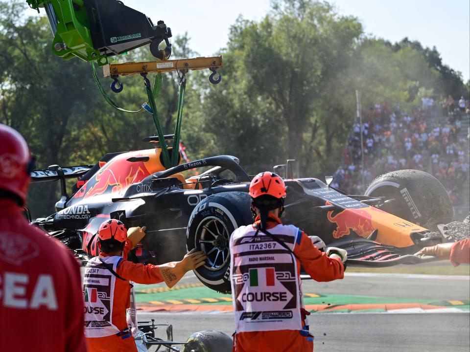 Max Verstappen’s car is removed after his crash at the Italian Grand Prix (AFP via Getty Images)