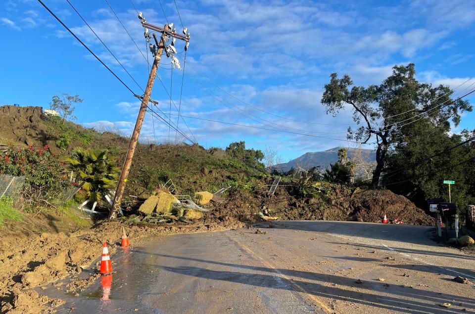 A landslide covered lanes of Highway 150 in mud and debris at Bridge Road, north of Santa Paula, last week.