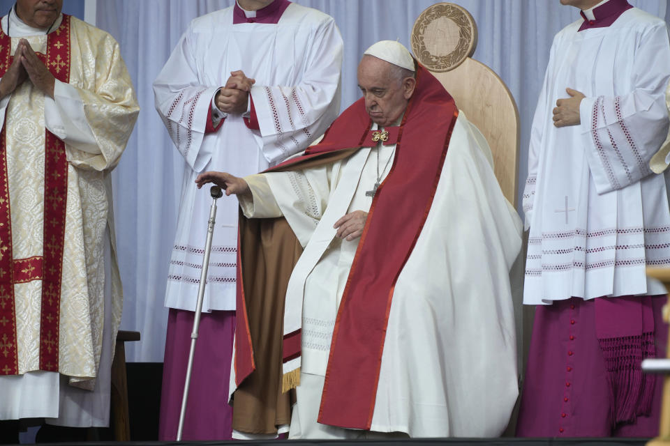 Pope Francis presides over a mass at the the Commonwealth Stadium in Edmonton, Canada, Tuesday, July 26, 2022. Pope Francis is on a second day of a "penitential" six-day visit to Canada to beg forgiveness from survivors of the country's residential schools, where Catholic missionaries contributed to the "cultural genocide" of generations of Indigenous children by trying to stamp out their languages, cultures and traditions. (AP Photo/Gregorio Borgia)