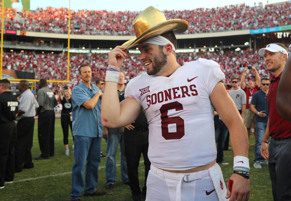 DALLAS, TX - OCTOBER 14:  Baker Mayfield #6 of the Oklahoma Sooners wears the Golden Hat Trophy after the 29-24 win over the Texas Longhorns at Cotton Bowl on October 14, 2017 in Dallas, Texas.  (Photo by Richard W. Rodriguez/Getty Images)