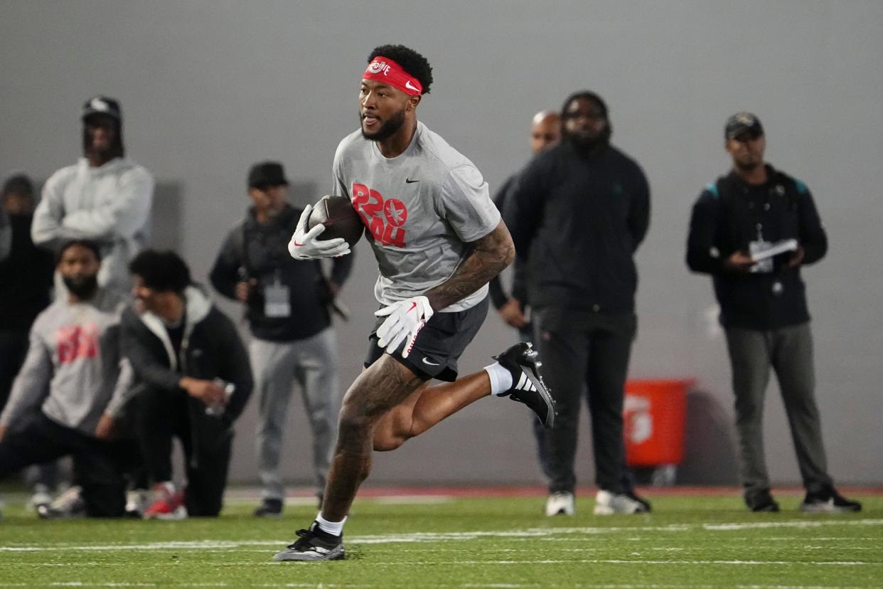 Mar 20, 2024; Columbus, Ohio, USA; Ohio State Buckeyes wide receiver Xavier Johnson works out for NFL scouts during Pro Day at the Woody Hayes Athletic Center.