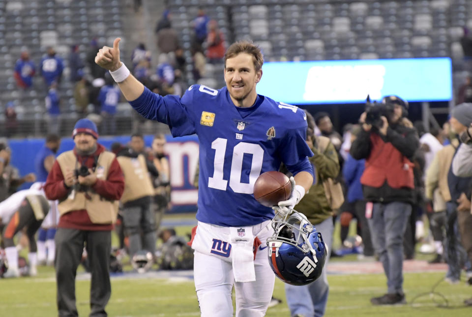 New York Giants quarterback Eli Manning gives a thumbs up to the crowd after an NFL football game against the Tampa Bay Buccaneers, Sunday, Nov. 18, 2018, in East Rutherford, N.J. The Giants defeated the Buccaneers 38-35. (AP Photo/Bill Kostroun)