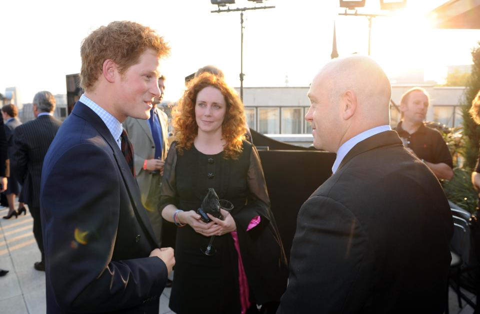 LONDON, ENGLAND - MAY 7:  (NO PUBLICATION IN UK MEDIA FOR 28 DAYS) Prince Harry chats with newspaper editor Rebekah Wade and actor Ross Kemp at a reception before 'City Salute', a sunset pageant to celebrate and support British service personnel and their families, outside St. Paul's Cathedral on May 7, 2008 in London, England.  (Photo by POOL/Tim Graham Picture Library/Getty Images)