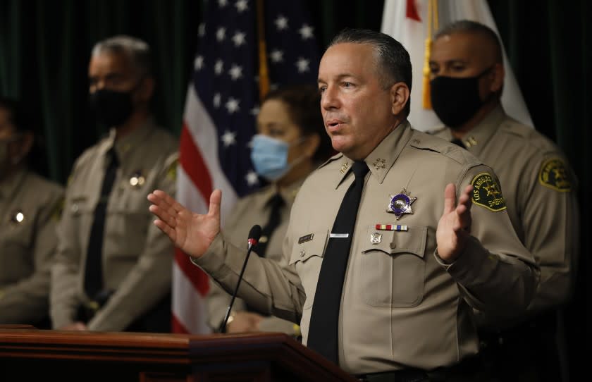 LOS ANGELES, CA - MAY 26: Los Angeles County Sheriff Alex Villanueva discusses organizational change, transparency, accountability and how they relate to the issue of deputy cliques during a press conference at the Hall of Justice Wednesday May 26, 2021. The Sheriff also addressed a damages claim filed by the city of Compton against Los Angeles County today, alleging the sheriff's department has bilked the city out of millions of dollars by falsely reporting the amount of time deputies spend patrolling the city. Sheriff Alex Villanueva dismissed the allegations. "We have about 45 contracts and we measure the minutes, and there's a rate -- we have to get close to 100%, either slightly above or slightly below,'' Villanueva said. "If we're missing that target, I don't think it's going to be the grand conspiracy that the outgoing mayor of Compton wants it to be. "But we'll definitely take the allegation seriously, and we are already doing a thorough audit on it, and we'll take action based on the results of that. Nothing unusual there. But to call it a fraud, that might be a little bit of a stretch.'' Hall of Justice on Wednesday, May 26, 2021 in Los Angeles, CA. (Al Seib / Los Angeles Times).