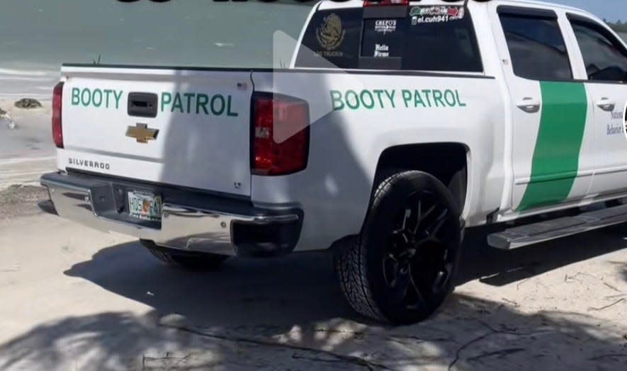 "Booty Patrol" car was inspired by a border patrol car, according to the owner. Police say he impersonated an officer but only gave him a ticket for "certain lights prohibited."