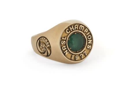 A 1977 North American Soccer League (NASL) Champions ring presented to Pele for being a member of the 1977 NASL champion Cosmos, previously called the "New York Cosmos," is shown in this handout photo released on March 8, 2016. REUTERS/Julien's Auctions/Handout via Reuters
