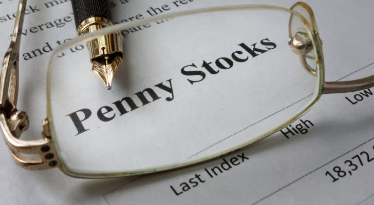 Page of newspaper with words penny stocks. high return penny stocks