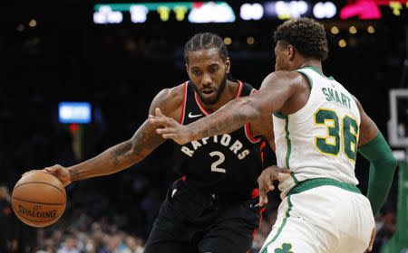 Jan 16, 2019; Boston, MA, USA; Toronto Raptors forward Kawhi Leonard (2) drives the ball against Boston Celtics guard Marcus Smart (36) in the third quarter at TD Garden. Mandatory Credit: David Butler II-USA TODAY Sports