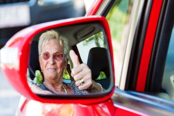 older woman wearing a seatbelt...