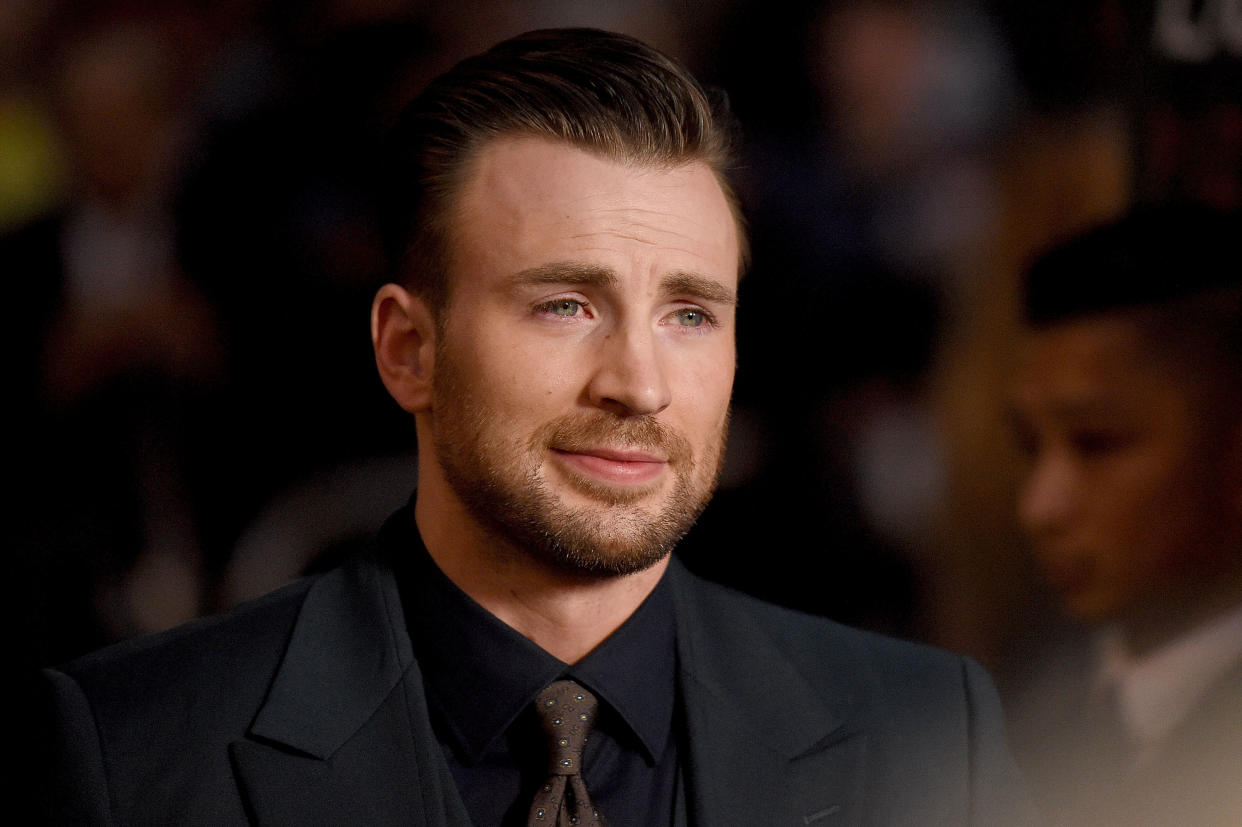 Chris Evans shares videos of him and his girlfriend Alba Baptista on Instagram. (Photo: Mike Windle/Getty Images)