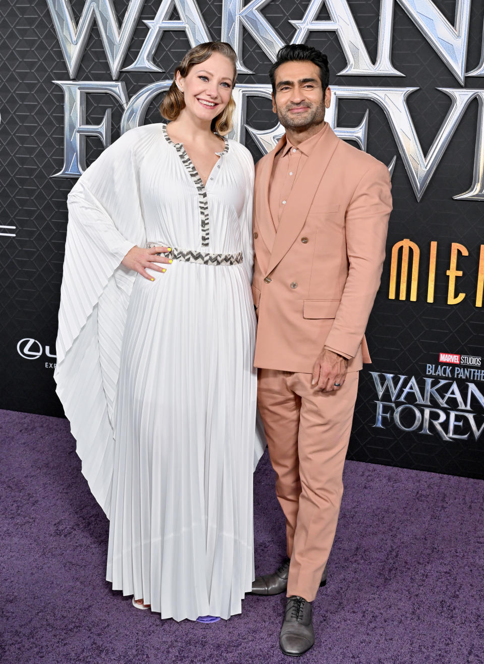 Emily wore a pleated gown and Kumail wore a neutral monochrome suit