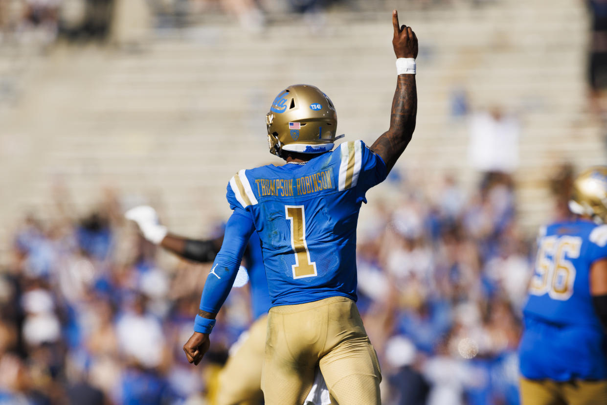 PASADENA, CA - OCTOBER 8: UCLA Bruins quarterback Dorian Thompson-Robinson (1) celebrates his touchdown pass during the college football game between the Utah Utes and the UCLA Bruins on Saturday, October 8, 2022 at the Rose Bowl in Pasadena, CA. (Photo by Ric Tapia/Icon Sportswire via Getty Images)