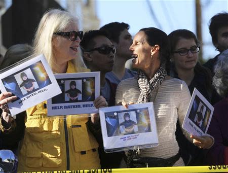 Fans of five-year-old leukemia survivor Miles Scott, aka "Batkid" cheer as part of a day arranged by the Make- A - Wish Foundation in San Francisco, California November 15, 2013. REUTERS/Robert Galbraith