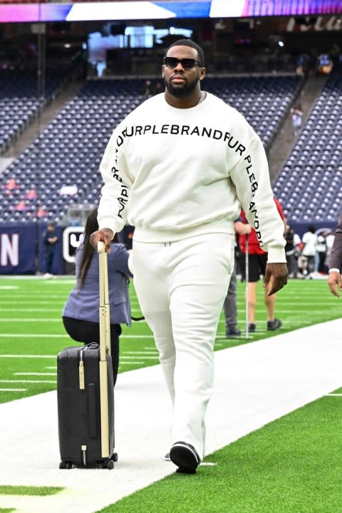 Cleveland Browns offensive tackle Leroy Watson IV arrives prior to an NFL wild-card playoff football game, Saturday, Jan 13, 2024, in Houston. (AP Photo/Maria Lysaker)
