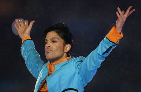 Prince performs during the halftime show of the NFL's Super Bowl XLI football game in Miami, Florida February 4, 2007. REUTERS/Mike Blake/File Photo