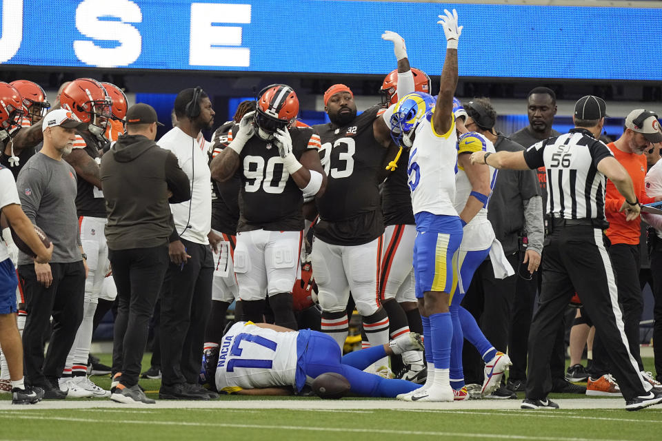 Los Angeles Rams wide receiver Puka Nacua (17) goes down with an injury on the Cleveland Browns sideline during the first half of an NFL football game Sunday, Dec. 3, 2023, in Inglewood, Calif. (AP Photo/Mark J. Terrill)