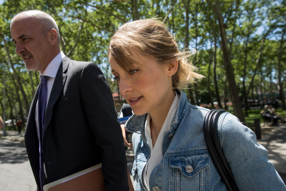 NEW YORK, NY - JUNE 12:  Actress Allison Mack arrives at the U.S. District Court for the Eastern District of New York for a status conference, June 12, 2018 in the Brooklyn borough of New York City. Mack was charged in April with sex trafficking for her involvement with a self-help organization for women that forced members into sexual acts with their leader. The group, called Nxivm, was led by founder Keith Raniere, who was arrested in March on sex-trafficking charges. (Photo by Drew Angerer/Getty Images)