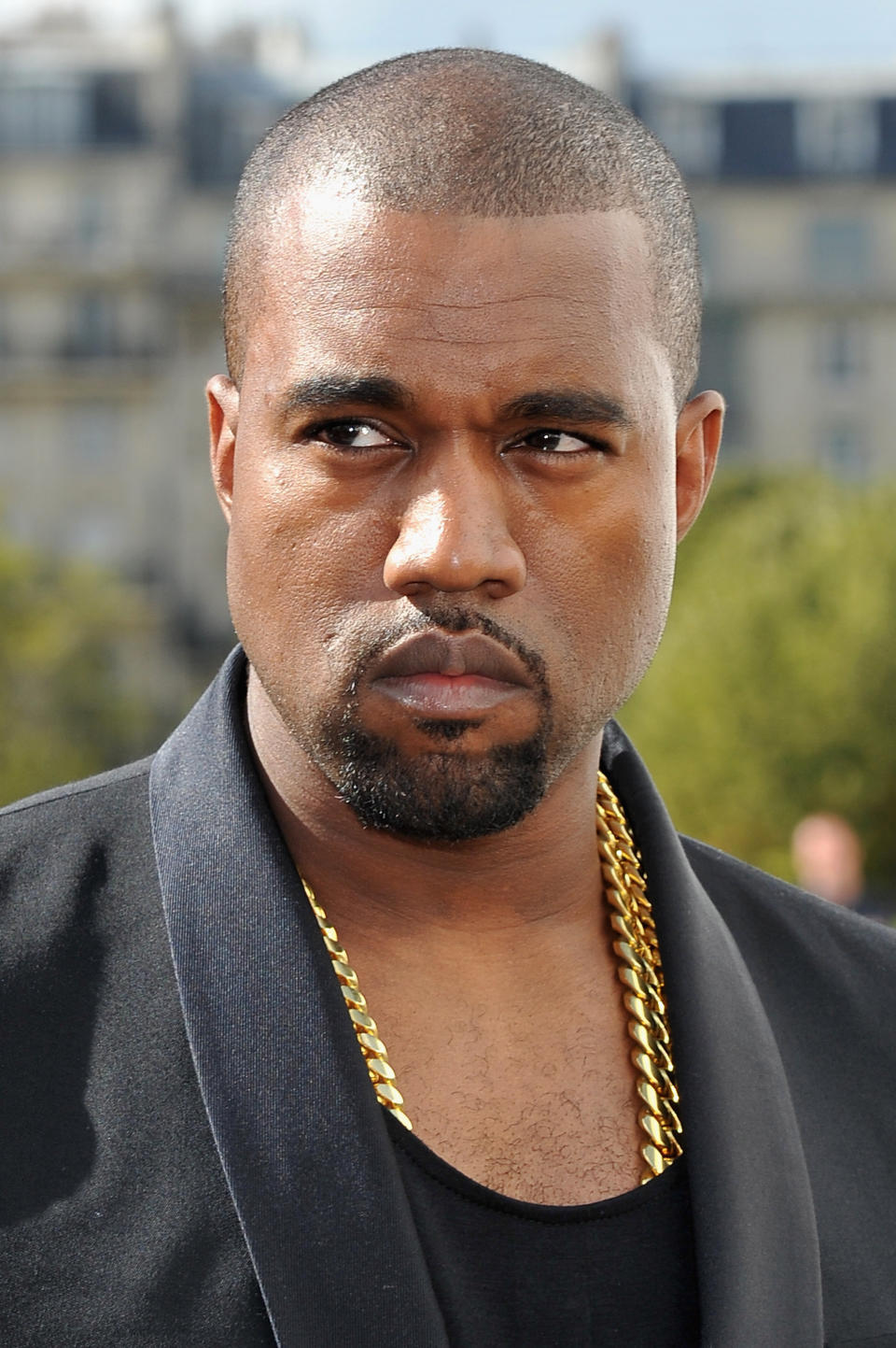 PARIS, FRANCE - SEPTEMBER 28: Kanye West arrives at the Christian Dior Spring / Summer 2013 show as part of Paris Fashion Week on September 28, 2012 in Paris, France. (Photo by Pascal Le Segretain/Getty Images)