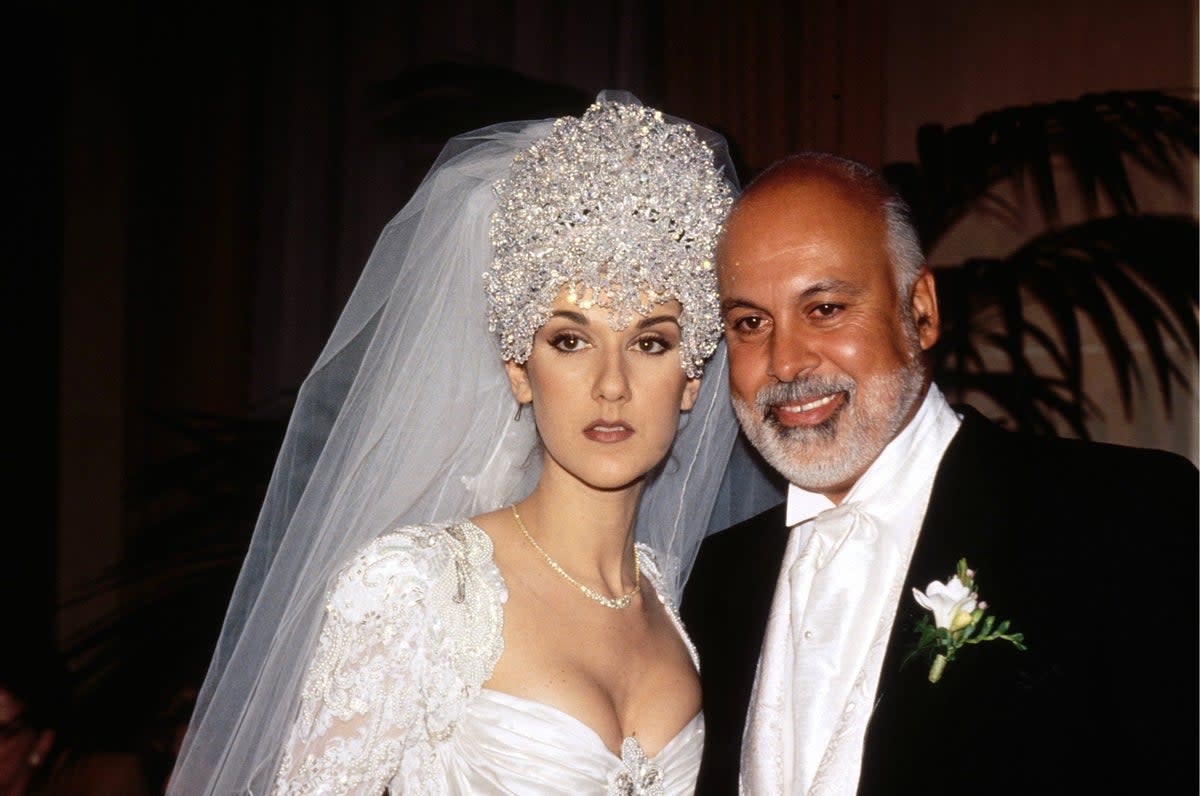 Celine Dion and husband René Angélil on their wedding day in December 1994 (Gamma Rapho via Getty)