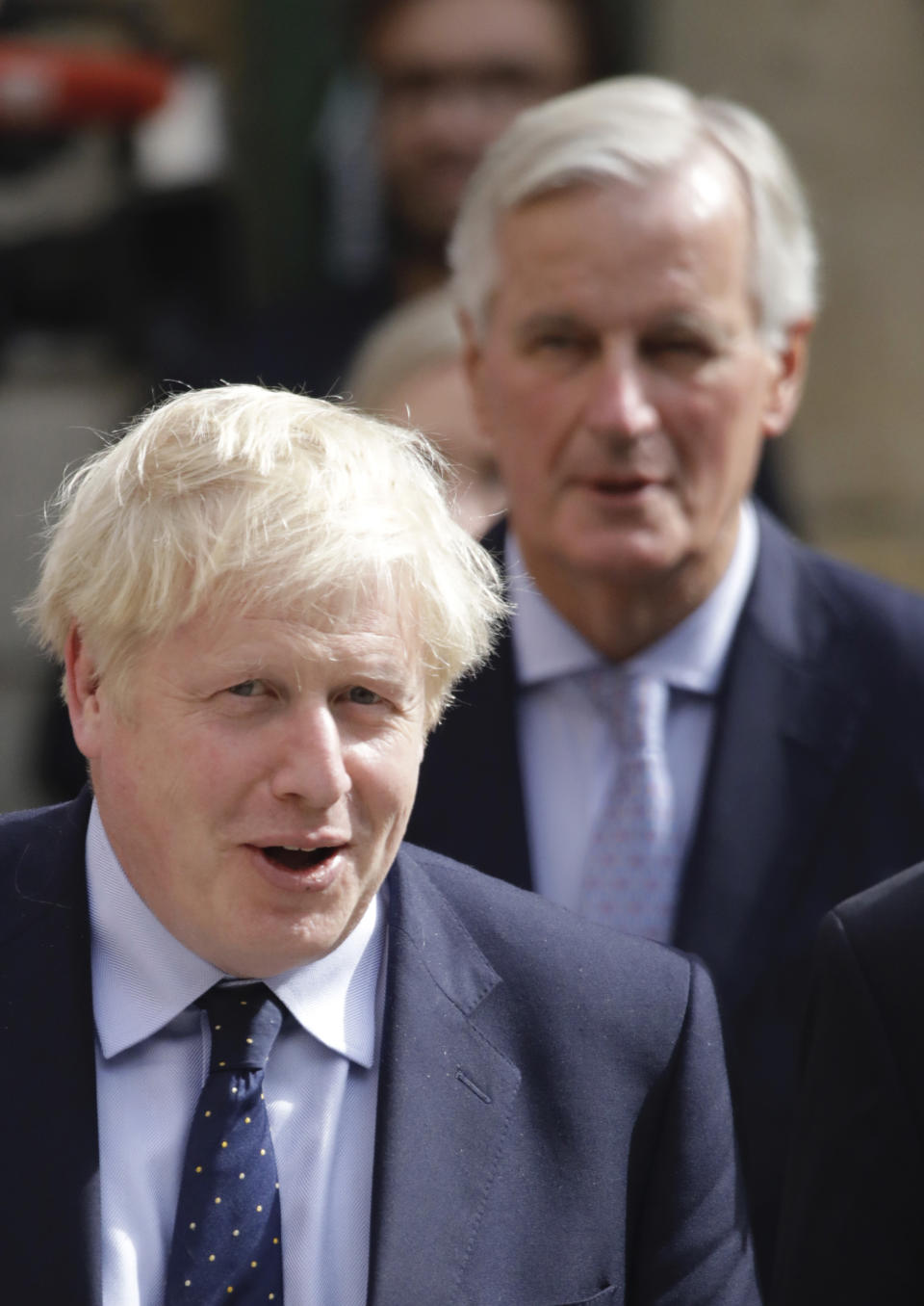 British Prime Minister Boris Johnson, left, and European Union chief Brexit negotiator Michel Barnier depart after a meeting with European Commission President Jean-Claude Juncker in Luxembourg, Monday, Sept. 16, 2019. British Prime Minister Boris Johnson held his first meeting with European Commission President Jean-Claude Juncker on Monday in search of a longshot Brexit deal. (AP Photo/Olivier Matthys)