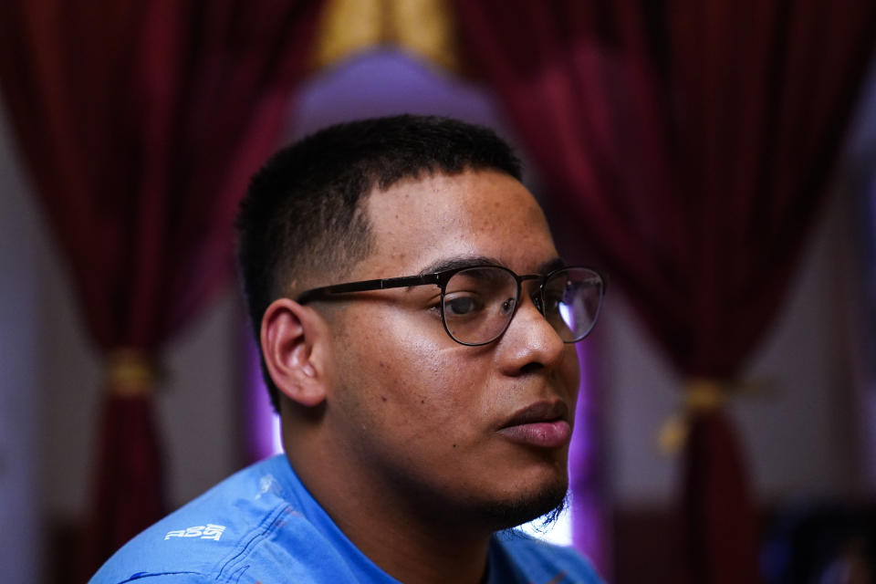 Mino Zuniga Gonzales, 19, speaks during an interview with The Associated Press in the Kensington section of Philadelphia, Sunday, May 16, 2021. Gonzales and his brother are trying to rebuild their lives together with their mother Keldy Mabel Gonzales Brebe, a 37-year-old Honduran immigrant, after they were separated under a former "zero-tolerance" policy to criminally prosecute adults who entered the country illegally. (AP Photo/Matt Rourke)