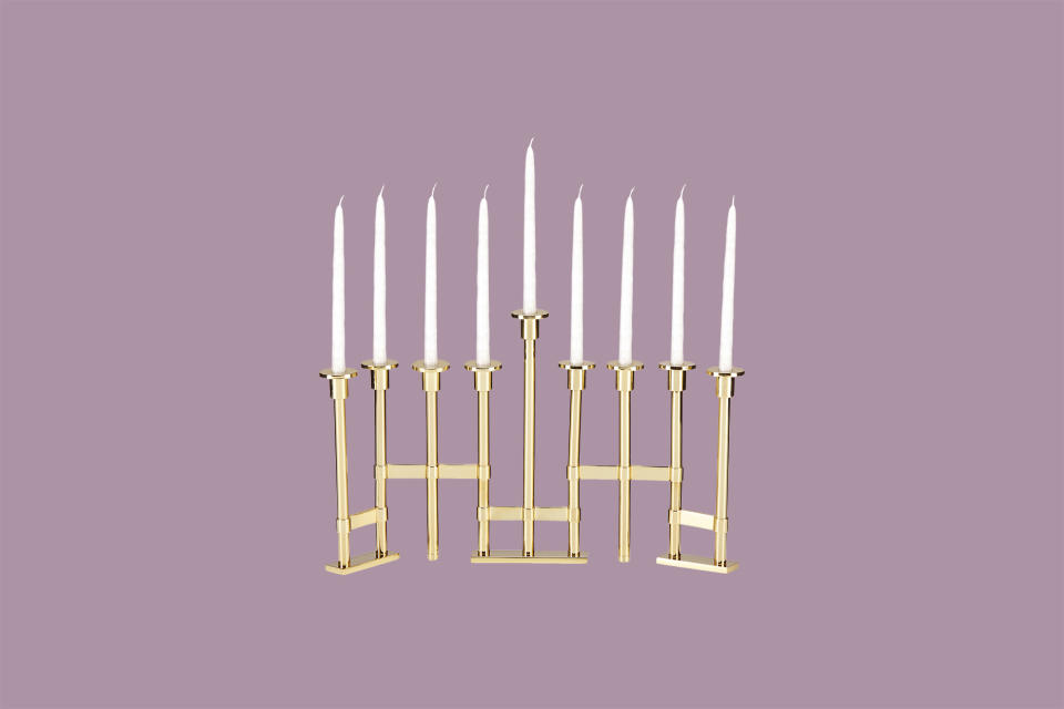 <p>Give your holiday table a Midas touch. This geometric menorah from Kate Spade New York boasts clean lines and a gold-plated finish that will shine as brightly as the candles it holds.</p><p><em>Kate Spade Oak Street Menorah, $200, </em><a href="https://click.linksynergy.com/deeplink?id=93xLBvPhAeE&mid=42608&u1=MMSLHOLModernMenorahsCBiggsOct19&murl=https%3A%2F%2Fwww.katespade.com%2Fproducts%2Foak-street-menorah%2F882864675675.html" rel="nofollow noopener" target="_blank" data-ylk="slk:katespade.com;elm:context_link;itc:0;sec:content-canvas" class="link "><em>katespade.com</em></a><em>.</em></p>