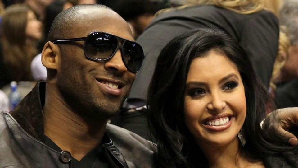 In this Feb 13, 2010 photo, Los Angeles Lakers star Kobe Bryant and his wife, Vanessa, enjoy themselves during the Taco Bell Skills Challenge, part of 2010 NBA All-Star Weekend in Dallas, Texas. (Photo by Jed Jacobsohn/Getty Images)