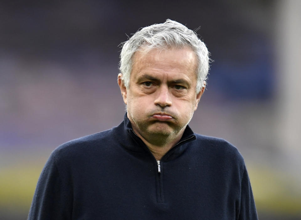 FILE - In this Friday, April 16, 2021 file photo, Tottenham's manager Jose Mourinho looks on during the warm up session before the English Premier League soccer match between Everton and Tottenham Hotspur at Goodison Park in Liverpool, England. A person with knowledge of the situation says Tottenham has fired manger Jose Mourinho. The person spoke on condition of anonymity because the decision has not yet been made public by Tottenham. Mourinho took over in November 2019. His firing comes with seventh-place Tottenham outside the Champions League places but with a League Cup final against Manchester City on Sunday, April 18, 2021. (Peter Powell/Pool via AP, File)