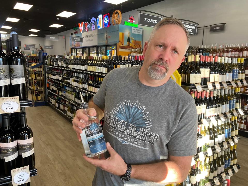 Rob Lombardi, owner of Regret Distillery, based in Raynham, does a tasting at Liquor World in South Easton on Thursday, March 8, 2024.