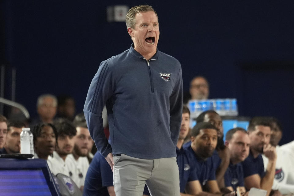 Florida Atlantic head coach Dusty May gestures during the first half of an NCAA college basketball game Wichita State , Thursday, Jan. 18, 2024, in Boca Raton, Fla. (AP Photo/Marta Lavandier)